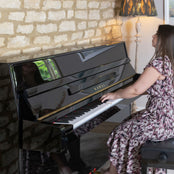 Kawai K15E Upright Piano; Polished Ebony
