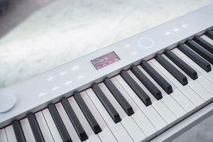 Casio Privia PX-S7000 Digital Piano with Wooden Keys; White