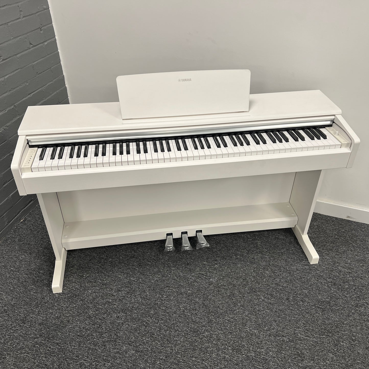Yamaha YDP145 White Digital Piano; Serial No: BCBZ01001; Ex Display Model; 3 Year Warranty