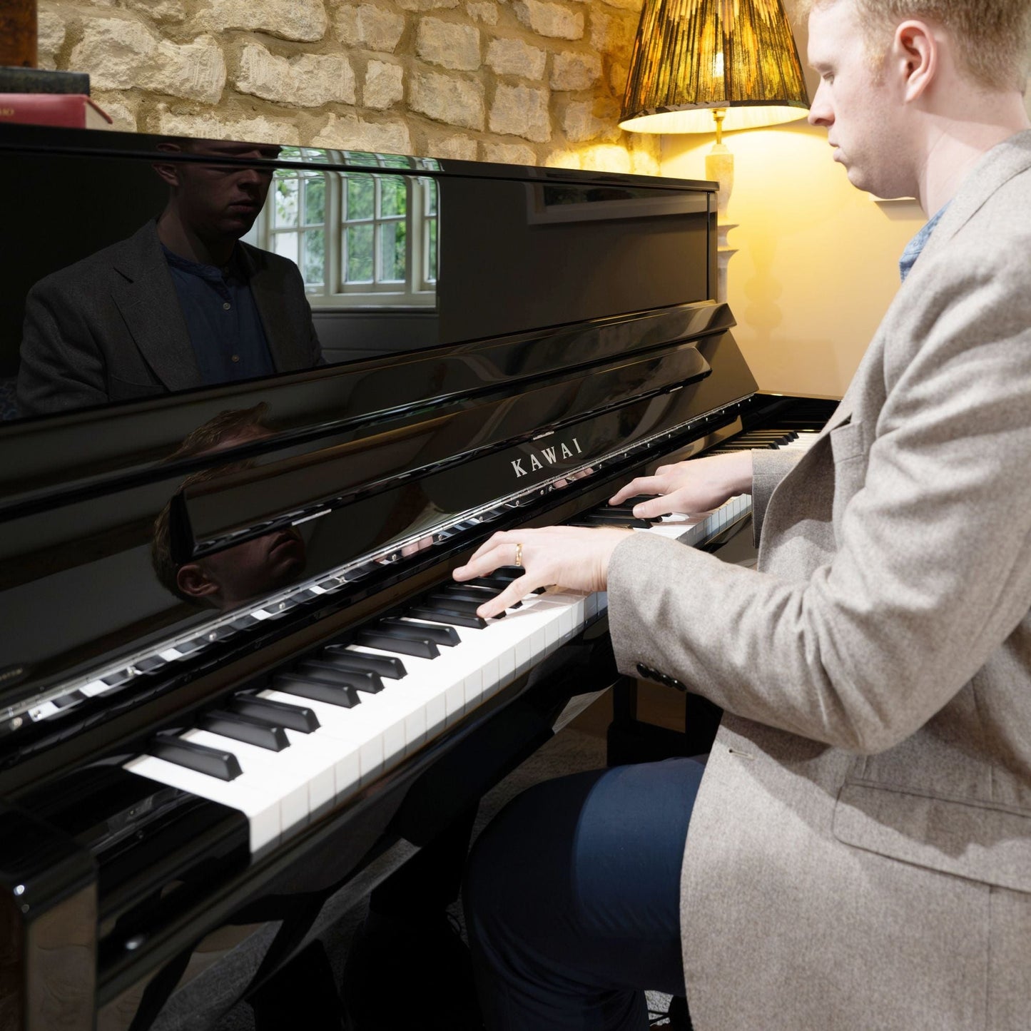 Kawai K300 Upright Piano; Polished Ebony & Silver Fittings